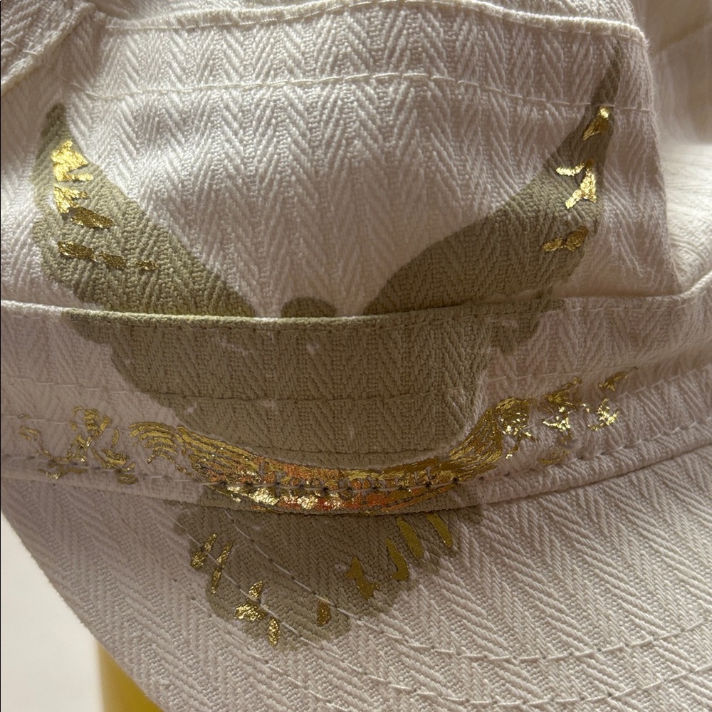 Stylish Cream Cap with Gold Accents
